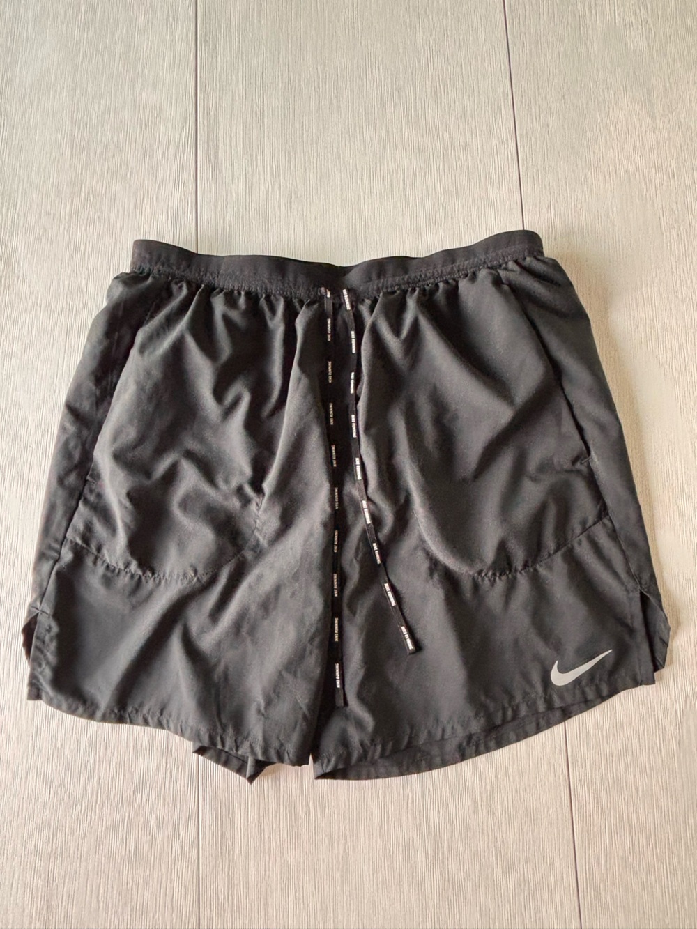 Nike Men’s Black Athletic Shorts with Silver Swoosh